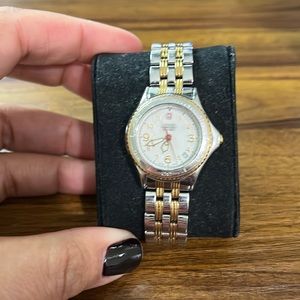 Swiss Army gold and silver woman’s watch